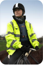 Horse rider wearing WT-200 receiver and induction loop
